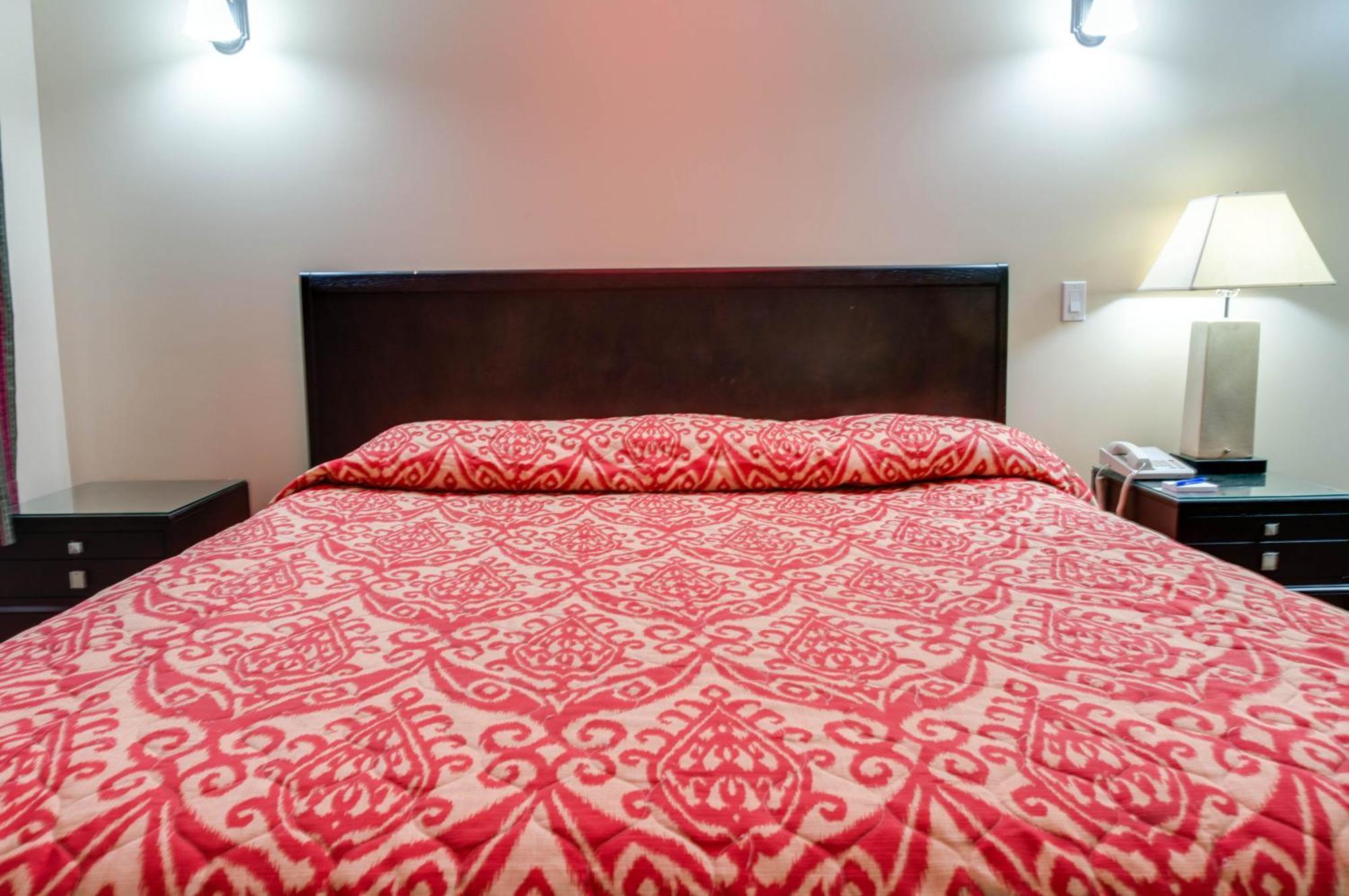 Sky Palm Motel - Orange Room photo